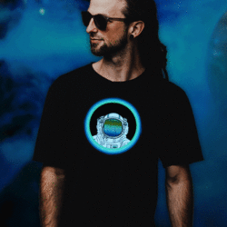 Man in dreadlocks wearing sunglasses and an astronaut equalizer light up shirt that animates to sound and music