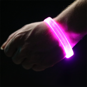 Close up of Pink LED Bracelet on Wrist with hand in a fist