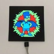 Bart Simpson super hero design lighting up on black EL panel in light setting