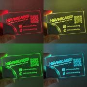 Grid of four pictures showing the same laser engraved print on acrylic LED business cards, each lighting up a different color