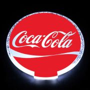 coca-cola logo lighting up on LED coaster