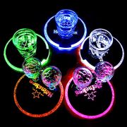 circle of 5 Heineken custom led coasters each lighting up different neon colors
