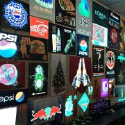 Wall full of light up animated custom posters plugged in