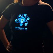 Girl posing with hands on hips wearing a personalized healthcare lighted t-shirt