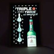 Jameson liquor iilluminated poster lighting up brightly