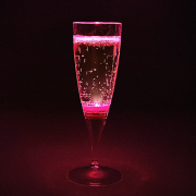 Pink LED Champagne glass lighting up hot pink