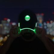 man wearing a light up hat glowing