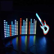 Music equalizer guitar design lighting up in dark room