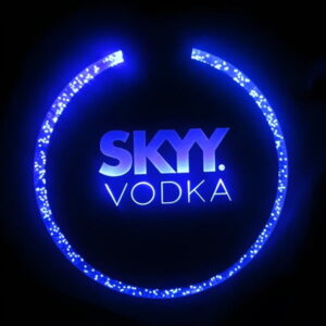 Skyy vodka company logo lighting up blue on custom LED coaster