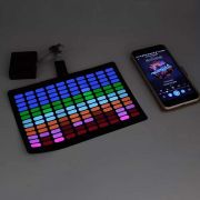 equalizer design on el panel with phone next to it to show it lights up to sound and music