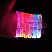 Six LED bracelets on hand all lighting up different color