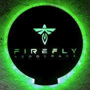 firefly aerospace custom logo on LED coaster glowing bright green