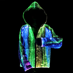 Person in dark room zipping up hooded sweatshirt that is lighting up in rainbow color effect