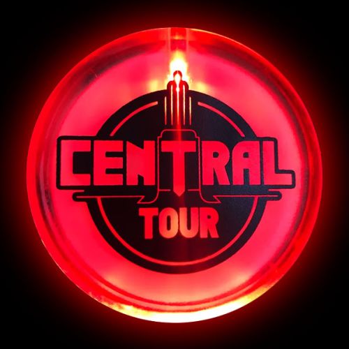 Central Tour custom logo on LED pin glowing bright red