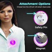 Woman wearing glowing pink LED pin, showing two different ways the pin can attach: safety pin or magnet