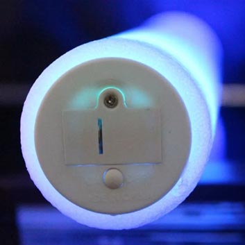 close up of battery compartment in bottom of led foam stick