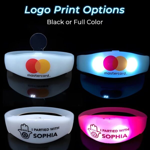 Two silicone remote activated bracelets with printed logo