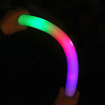 hands bending LED foam stick lighting up in neon colors
