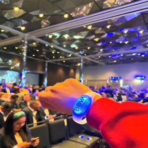 blue remote activated concert soft silicone bracelet at a show