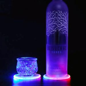 LED coasters illuminating alcohol for party club and bar