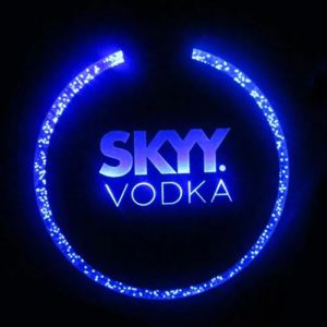 Skyy vodka company logo lighting up blue on custom LED coaster