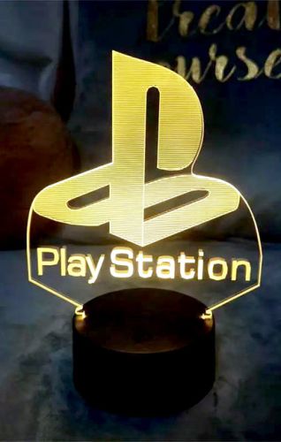 playstation logo on edge lit sign glowing yellow