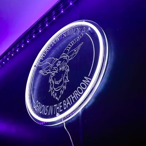 goat logo on round led neon sign glowing