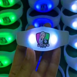 close up showing printed design on silicone remote controlled LED bracelets