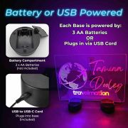 led centerpiece sign highlighting a battery compartment and USB plug for power supply