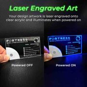 A light up acrylic card featuring a laser engraved design, shown both illuminated and unlit to highlight the design's precision and clarity