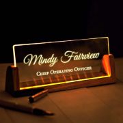 Personalized name light sign with a wooden base, glowing desk sign featuring an etched custom design