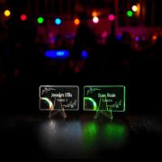 light up acrylic card display featuring names and table numbers glowing