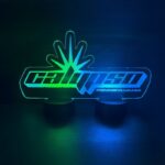 Battery-powered cut-to-shape acrylic sign illuminated in blue and green