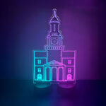 Cut-to-shape building acrylic LED centerpiece glowing purple and teal on a formal gala dinner table